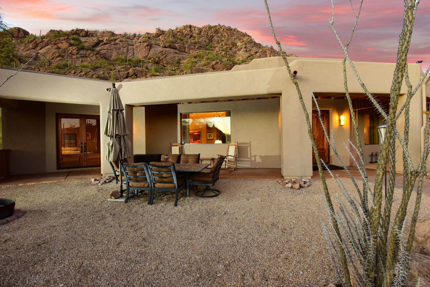 Desert yard with open sky at dusk