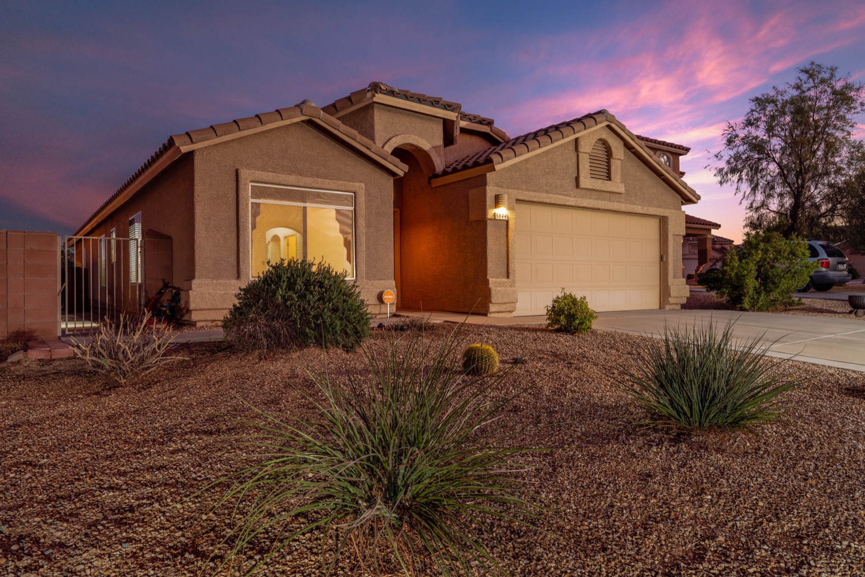 Tucson home under a violet evening sky