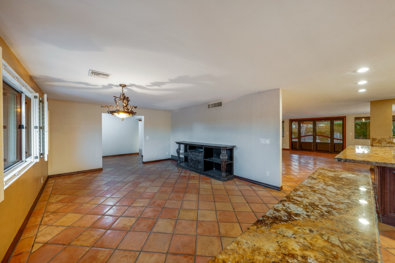 Living and dining areas viewed from the kitchen counter